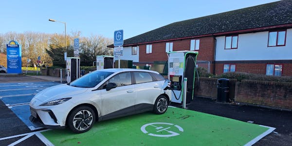 White MG charging at Strensham North in the sunshine