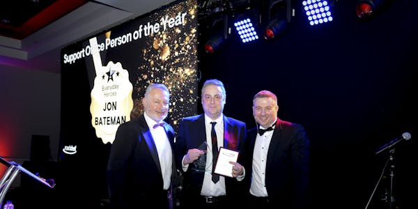 Jon Bateman collects the award for Support Office Person of the Year from Roadchef CEO Mark Fox and Operations Director, Peter Cossar